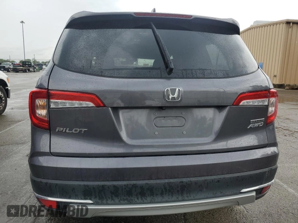 2020 Honda Pilot Touring 7-Passenger z VIN 5FNYF6H68LB052379, wystawiony jako Copart lot #57655775 z przebiegiem 73 501 mil mil oraz Szkoda całkowita • Salvage title. Historia ofert i sprzedaży dostępna na DreamBid. Obrazek 6.
