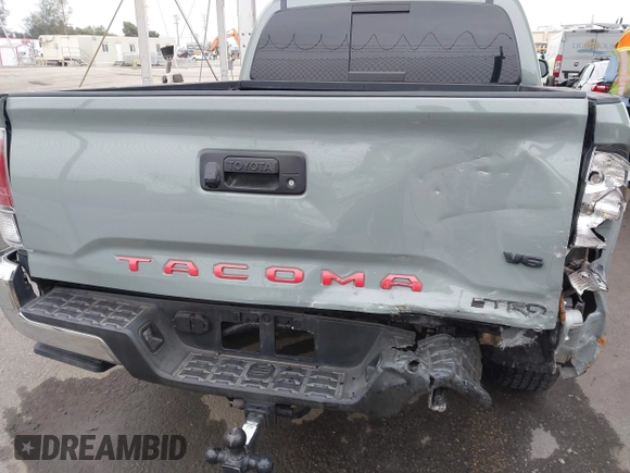 2023 Toyota Tacoma SR z VIN 3TMCZ5AN1PM602567, wystawiony jako IAAI lot #42355648 z przebiegiem 32 472 mil mil oraz . Historia ofert i sprzedaży dostępna na DreamBid. Obrazek 6.