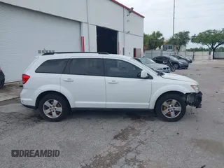 2012 Dodge Journey SXT with VIN 3C4PDCBG3CT331693, listed as a IAAI auction lot 42624751 with 165,480 mi miles and . Bid and sale history available at DreamBid. Image 14.