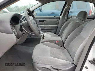 2007 Ford Taurus SE z VIN 1FAFP53U87A138588, wystawiony jako Copart lot #56965245 z przebiegiem Nie podano mil oraz Szkoda całkowita • Salvage title. Historia ofert i sprzedaży dostępna na DreamBid. Obrazek 7.