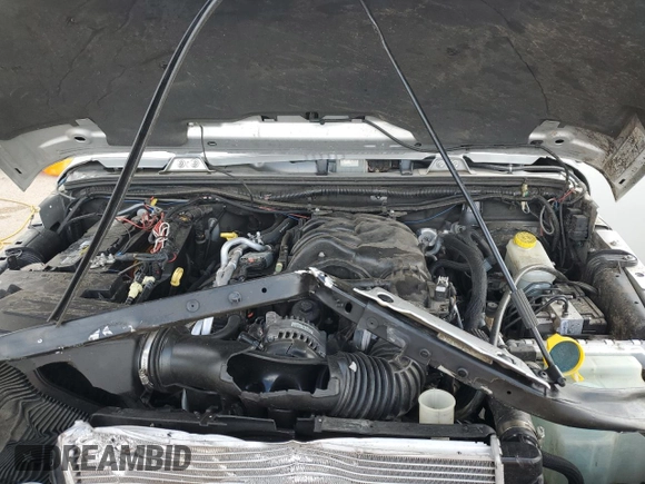 2012 Jeep Wrangler Unlimited Altitude with VIN 1C4HJWEG8CL163653, listed as a Copart auction lot 55279045 with 107,076 mi miles and Salvage title. Bid and sale history available at DreamBid. Image 12.