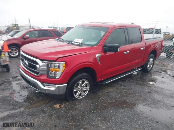 2021 Ford F-150 XL with VIN 1FTFW1E84MKE97559, listed as a IAAI auction lot 41544523 with 54,867 mi miles. Bid and sale history available at carsss.com. Image 2.