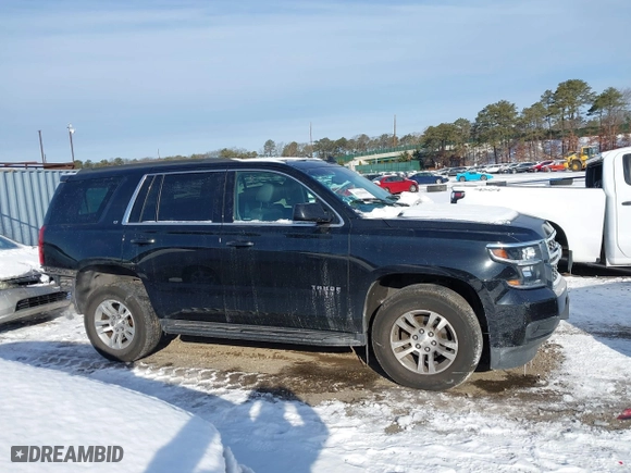 2019 Chevrolet Tahoe LT with VIN 1GNSKBKC7KR138999, listed as a IAAI auction lot 41339420 with 74,297 mi miles. Bid and sale history available at carsss.com. Image 13.
