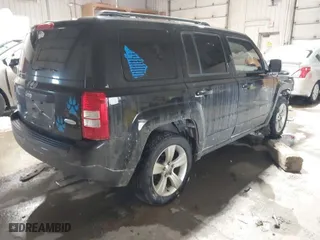 2014 Jeep Patriot Latitude with VIN 1C4NJRFBXED510937, listed as a IAAI auction lot 41577060 with 146,403 mi miles. Bid and sale history available at carsss.com. Image 4.