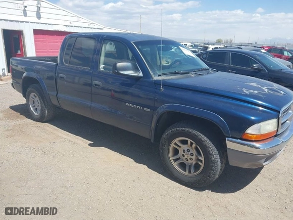 2002 Dodge Dakota SLT with VIN 1B7HL48N32S708719, listed as a IAAI auction lot 42027763 with 217,797 mi miles. Bid and sale history available at carsss.com. Image 1.