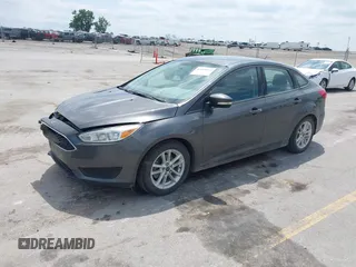 2016 Ford Focus SE z VIN 1FADP3F2XGL298174, wystawiony jako IAAI lot #42468032 z przebiegiem 236 803 mil mil oraz . Historia ofert i sprzedaży dostępna na DreamBid. Obrazek 2.