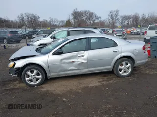 2005 Dodge Stratus SXT z VIN 1B3EL46R05N513027, wystawiony jako IAAI lot #41560225 z przebiegiem 213 877 mil mil oraz . Historia ofert i sprzedaży dostępna na DreamBid. Obrazek 13.