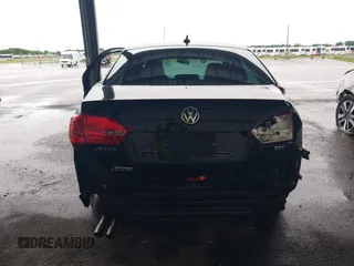 2012 Volkswagen Jetta TDI w/Premium & Nav with VIN 3VWLL7AJ8CM326549, listed as a IAAI auction lot 42748170 with 200,385 mi miles and . Bid and sale history available at DreamBid. Image 17.