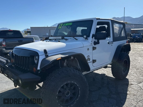 2012 Jeep Wrangler Sport with VIN 1C4GJWAG5CL201499, listed as a Copart auction lot 55247615 with 116,414 mi miles and Clean Title. Bid and sale history available at carsss.com. Image 2.