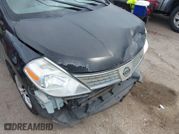 2009 Nissan Versa 1.8 S with VIN 3N1BC11E09L450167, listed as a IAAI auction lot 41711284 with 91,216 mi miles. Bid and sale history available at carsss.com. Image 6.