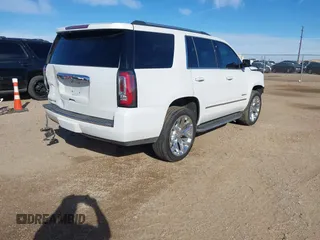 2020 GMC Yukon Denali with VIN 1GKS2CKJ3LR260455, listed as a IAAI auction lot 41690495 with 92,498 mi miles. Bid and sale history available at carsss.com. Image 4.