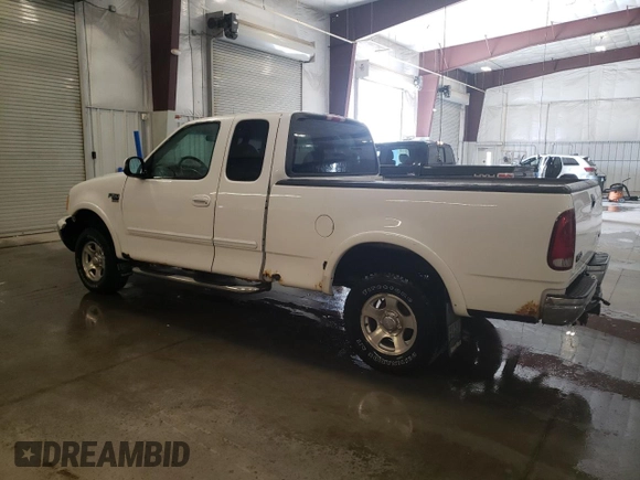 1999 Ford F-150 XL with VIN 2FTRX18L1XCA22096, listed as a Copart auction lot 52402885 with 120,254 mi miles and Salvage Title. Bid and sale history available at carsss.com. Image 2.