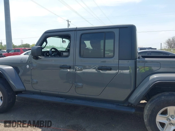 2021 Jeep Gladiator Sport S z VIN 1C6JJTAG9ML538769, wystawiony jako IAAI lot #42078142 z przebiegiem 49 924 mil mil oraz . Historia ofert i sprzedaży dostępna na DreamBid. Obrazek 14.