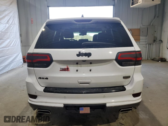 2015 Jeep Grand Cherokee Summit with VIN 1C4RJFJG1FC226591, listed as a Copart auction lot 52926115 with 130,803 mi miles and Salvage Title. Bid and sale history available at DreamBid. Image 6.
