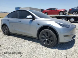 2024 Tesla Model Y Long Range with VIN 7SAYGDEE0RA288420, listed as a Copart auction lot 59159015 with 7,831 mi miles and Salvage title. Bid and sale history available at DreamBid. Image 4.