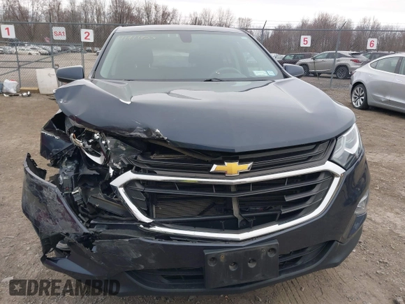 2018 Chevrolet Equinox LT with VIN 3GNAXJEV2JL293664, listed as a IAAI auction lot 41911923 with 105,057 mi miles and . Bid and sale history available at DreamBid. Image 13.