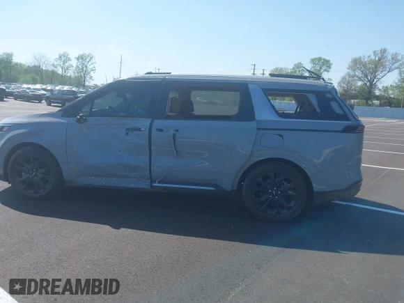2024 Kia Carnival SX Prestige with VIN KNDNE5H32R6340005, listed as a IAAI auction lot 41984379 with 37,525 mi miles and . Bid and sale history available at DreamBid. Image 13.