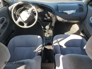 2003 Kia Spectra z VIN KNAFB121335277388, wystawiony jako Copart lot #46756185 z przebiegiem 151 235 mil mil oraz Szkoda całkowita • Salvage title. Historia ofert i sprzedaży dostępna na DreamBid. Obrazek 8.