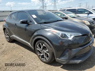 2018 Toyota C-HR XLE with VIN NMTKHMBX0JR014576, listed as a Copart auction lot 63263215 with 95,649 mi miles and Clean title. Bid and sale history available at DreamBid. Image 4.