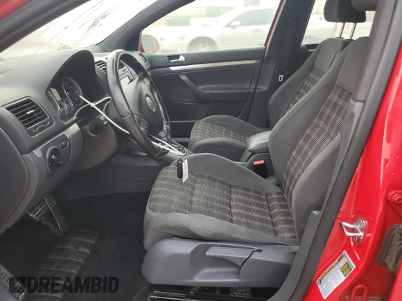 2009 Volkswagen Golf GTI z VIN WVWHV71K89W118353, wystawiony jako Copart lot #63072245 z przebiegiem 124 546 mil mil oraz Szkoda całkowita • Salvage title. Historia ofert i sprzedaży dostępna na DreamBid. Obrazek 7.