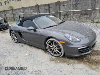 2014 Porsche Boxster z VIN WP0CA2A85EK120088, wystawiony jako Copart lot #61135784 z przebiegiem 24 667 mil mil oraz Szkoda całkowita • Salvage title. Historia ofert i sprzedaży dostępna na DreamBid. Obrazek 4.