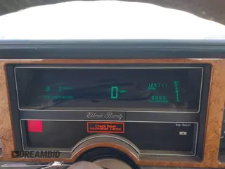 1989 Cadillac Eldorado with VIN 1G6EL1150KU621587, listed as a IAAI auction lot 42103841 with 129,711 mi miles and . Bid and sale history available at DreamBid. Image 7.