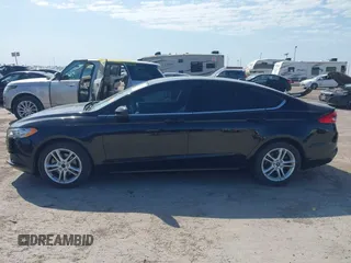 2018 Ford Fusion SE z VIN 3FA6P0H74JR125761, wystawiony jako IAAI lot #41992708 z przebiegiem 102 242 mil mil oraz . Historia ofert i sprzedaży dostępna na DreamBid. Obrazek 14.