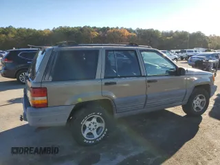 1997 Jeep Grand Cherokee TSi with VIN 1J4FX58S4VC516340, listed as a Copart auction lot 84409044 with 256,300 mi miles and Clean Title. Bid and sale history available at carsss.com. Image 3.
