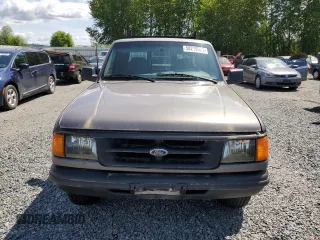 1995 Ford Ranger XL z VIN 1FTCR14A1SPA34776, wystawiony jako Copart lot #58215525 z przebiegiem 174 483 mil mil oraz Tytuł czysty. Historia ofert i sprzedaży dostępna na DreamBid. Obrazek 5.