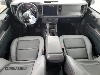 2024 Ford Bronco Big Bend z VIN 1FMDE7BH7RLA34989, wystawiony jako Copart lot #56479135 z przebiegiem 16 320 mil mil oraz Czysty tytuł • Clean title. Historia ofert i sprzedaży dostępna na DreamBid. Obrazek 8.