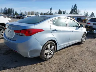 2011 Hyundai Elantra Ltd with VIN KMHDH4AE5BU099465, listed as a IAAI auction lot 41949975 with 80,037 mi miles. Bid and sale history available at carsss.com. Image 4.