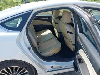 2017 Ford Fusion Titanium with VIN 3FA6P0K90HR168031, listed as a IAAI auction lot 42578926 with 210,268 mi miles and . Bid and sale history available at DreamBid. Image 8.