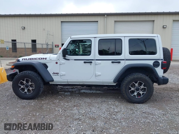 2021 Jeep Wrangler Unlimited Rubicon with VIN 1C4JJXFM9MW774142, listed as a IAAI auction lot 42625007 with 42,318 mi miles and . Bid and sale history available at DreamBid. Image 14.