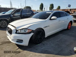 2014 Jaguar XJ with VIN SAJWA2GZ9E8V71794, listed as a Copart auction lot 74347574 with 106,172 mi miles and Clean Title. Bid and sale history available at carsss.com. Image 1.