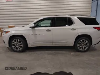 2021 Chevrolet Traverse Premier with VIN 1GNEVKKW7MJ218772, listed as a IAAI auction lot 42306743 with 106,898 mi miles and . Bid and sale history available at DreamBid. Image 14.