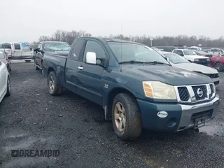 2004 Nissan Titan XE with VIN 1N6AA06A84N566348, listed as a IAAI auction lot 38569606 with 213,823 mi miles. Bid and sale history available at carsss.com. Image 1.