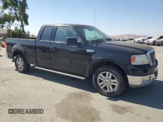 2004 Ford F-150 XL with VIN 1FTPX12574NB54075, listed as a Copart auction lot 59595475 with 215,844 mi miles and Clean title. Bid and sale history available at DreamBid. Image 4.