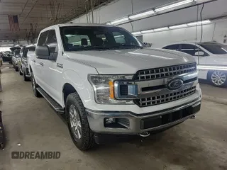 2018 Ford F-150 XL with VIN 1FTEW1E59JKD11351, listed as a IAAI auction lot 42663848 with 128,761 mi miles and . Bid and sale history available at DreamBid. Image 7.