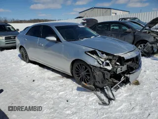 2014 Cadillac CTS AWD z VIN 1G6AW5SX2E0156853, wystawiony jako Copart lot #45991835 z przebiegiem 99 702 mil mil oraz Szkoda całkowita • Salvage title. Historia ofert i sprzedaży dostępna na DreamBid. Obrazek 4.