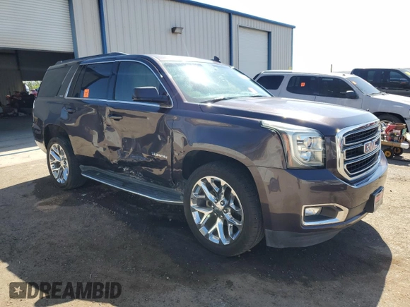 2015 GMC Yukon SLT z VIN 1GKS1BKC5FR689549, wystawiony jako Copart lot #56747385 z przebiegiem 102 856 mil mil oraz Szkoda całkowita • Salvage title. Historia ofert i sprzedaży dostępna na DreamBid. Obrazek 4.