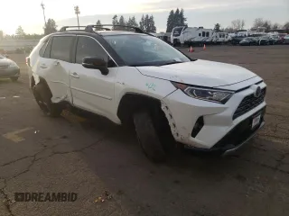 2020 Toyota RAV4 Hybrid XSE with VIN JTMEWRFV5LD541943, listed as a Copart auction lot 84005364 with 88,435 mi miles and Salvage title. Bid and sale history available at DreamBid. Image 4.