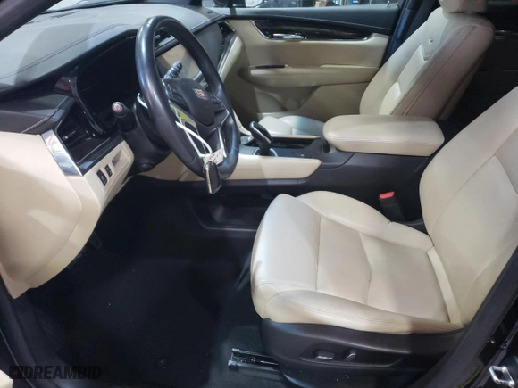 2017 Cadillac XT5 FWD with VIN 1GYKNARS4HZ212969, listed as a Copart auction lot 88758615 with 125,537 mi miles and Salvage Title. Bid and sale history available at carsss.com. Image 7.