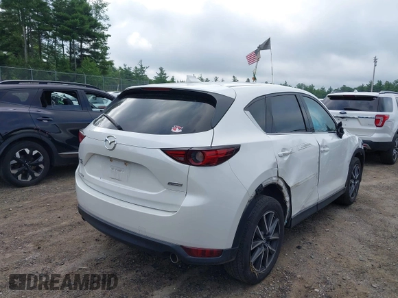 2018 Mazda CX-5 Grand Touring with VIN JM3KFBDM0J0308813, listed as a IAAI auction lot 42657978 with 78,119 mi miles and . Bid and sale history available at DreamBid. Image 4.