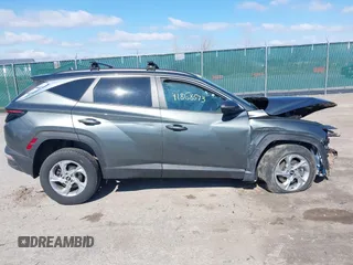 2022 Hyundai Tucson SEL with VIN 5NMJBCAE5NH137470, listed as a IAAI auction lot 41868573 with 28,034 mi miles and . Bid and sale history available at carsss.com. Image 13.