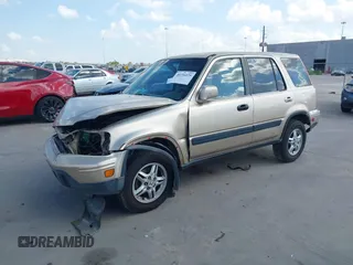 2000 Honda CR-V SE with VIN JHLRD1873YC039813, listed as a IAAI auction lot 40716079 with 214,067 mi miles. Bid and sale history available at carsss.com. Image 21.