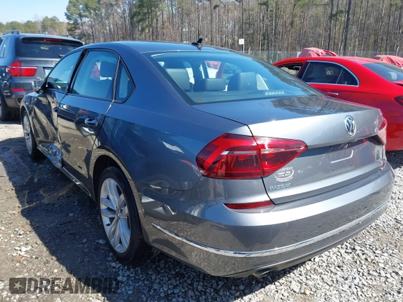 2019 Volkswagen Passat 2.0T Wolfsburg Edition with VIN 1VWLA7A38KC003562, listed as a IAAI auction lot 41704839 with 67,313 mi miles. Bid and sale history available at carsss.com. Image 3.