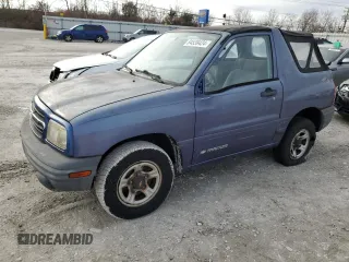 1999 Chevrolet Tracker z VIN 2CNBE18C4X6906275, wystawiony jako Copart lot #84539424 z przebiegiem 53 235 mil mil oraz Szkoda całkowita • Salvage title. Historia ofert i sprzedaży dostępna na DreamBid. Obrazek 1.