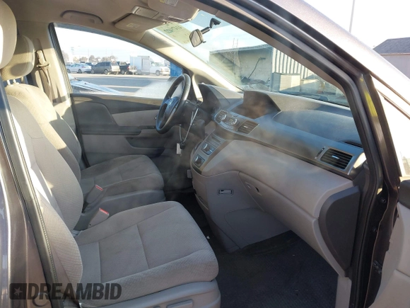 2015 Honda Odyssey LX с VIN 5FNRL5H27FB068761, выставлен на аукционе IAAI как лот 41479420 с пробегом 84 532 миль миль и . История ставок и продаж доступна на DreamBid. Изображение 5.
