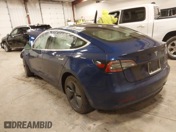 2018 Tesla Model 3 Long Range Battery with VIN 5YJ3E1EB7JF086201, listed as a IAAI auction lot 41965193 with 99,231 mi miles and . Bid and sale history available at DreamBid. Image 3.