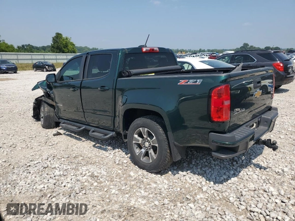 2015 Chevrolet Colorado 4WD Z71 with VIN 1GCGTCE35F1149677, listed as a Copart auction lot 64271015 with 39,671 mi miles and Clean title. Bid and sale history available at DreamBid. Image 2.